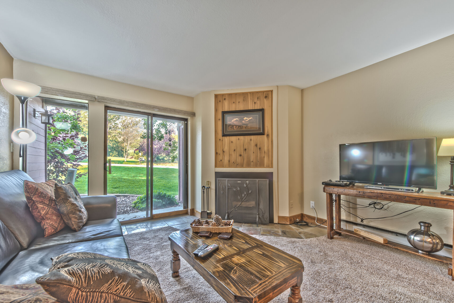 Living Room with Fireplace in Our One Bedroom Rentals.