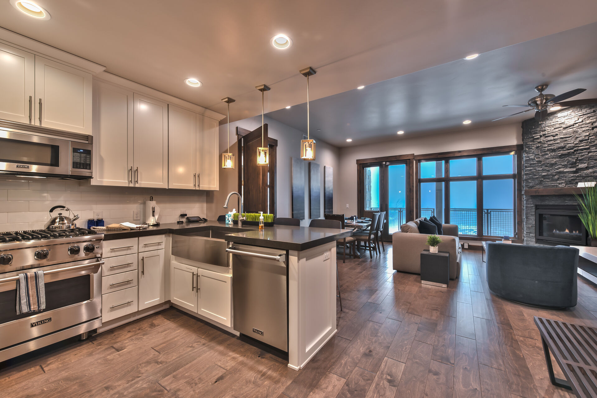 The Kitchen and Living Area with a Fireplace of Our Vacation Rentals in Park City, Utah.