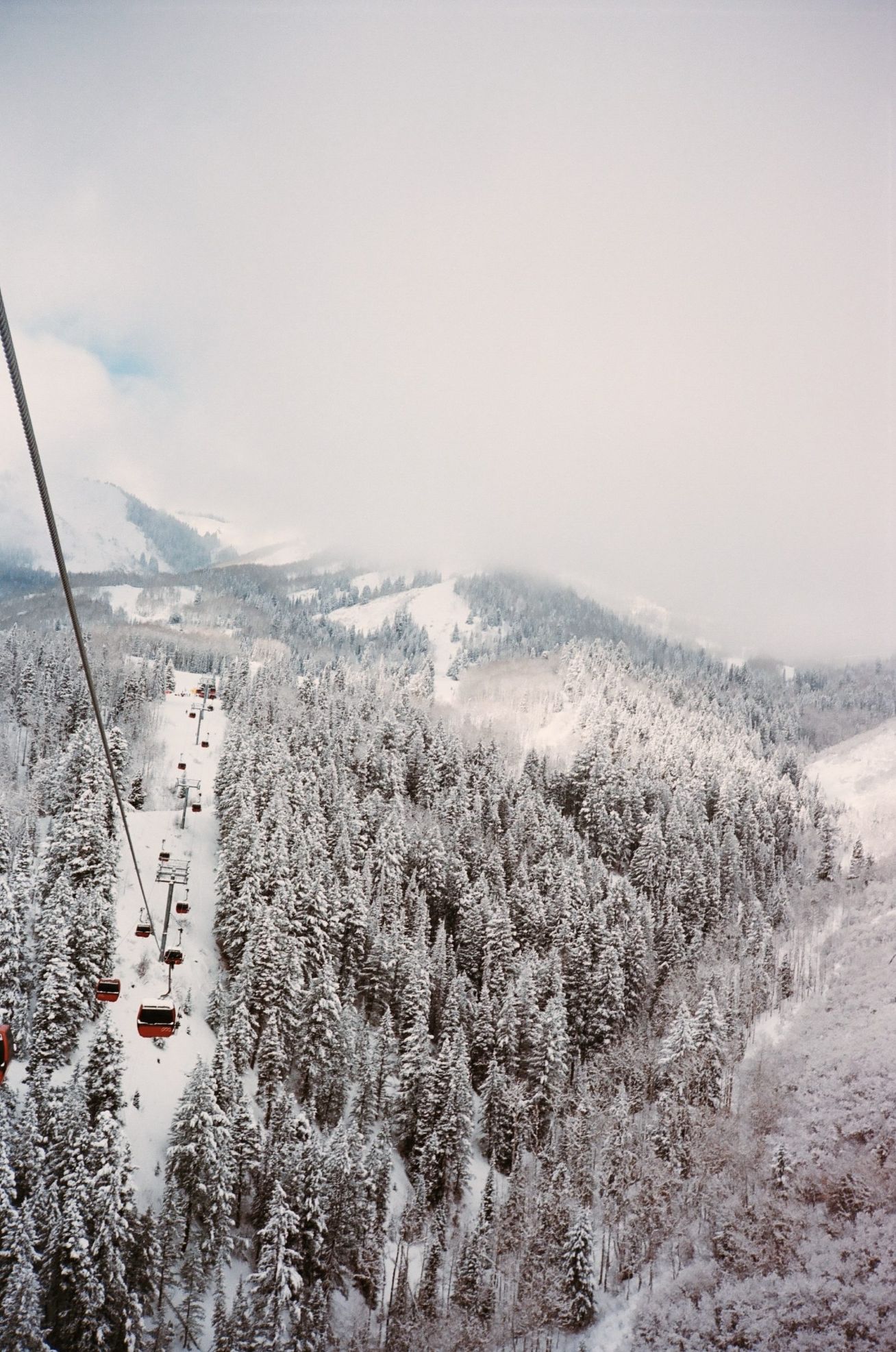 Snow Covered Mountains and Chairlift