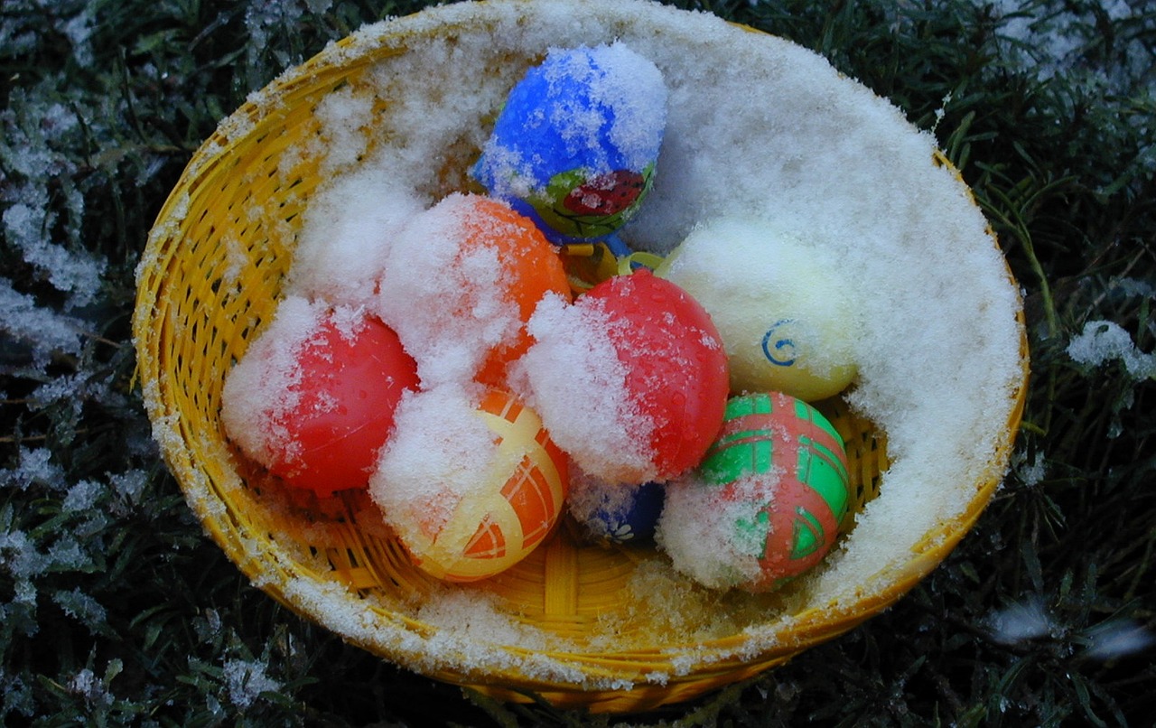 Easter eggs frozen over with snow